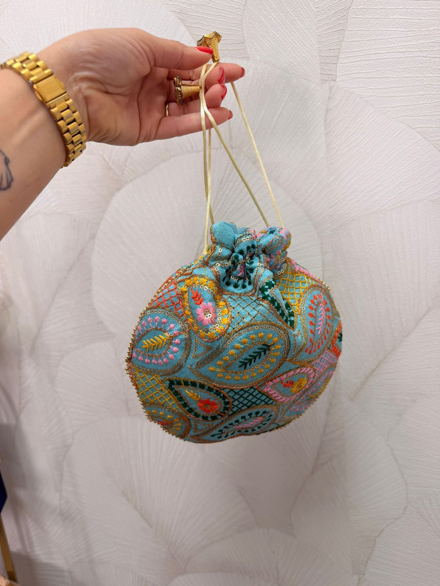 BOMBONERA TURQUESA ESTAMPADA